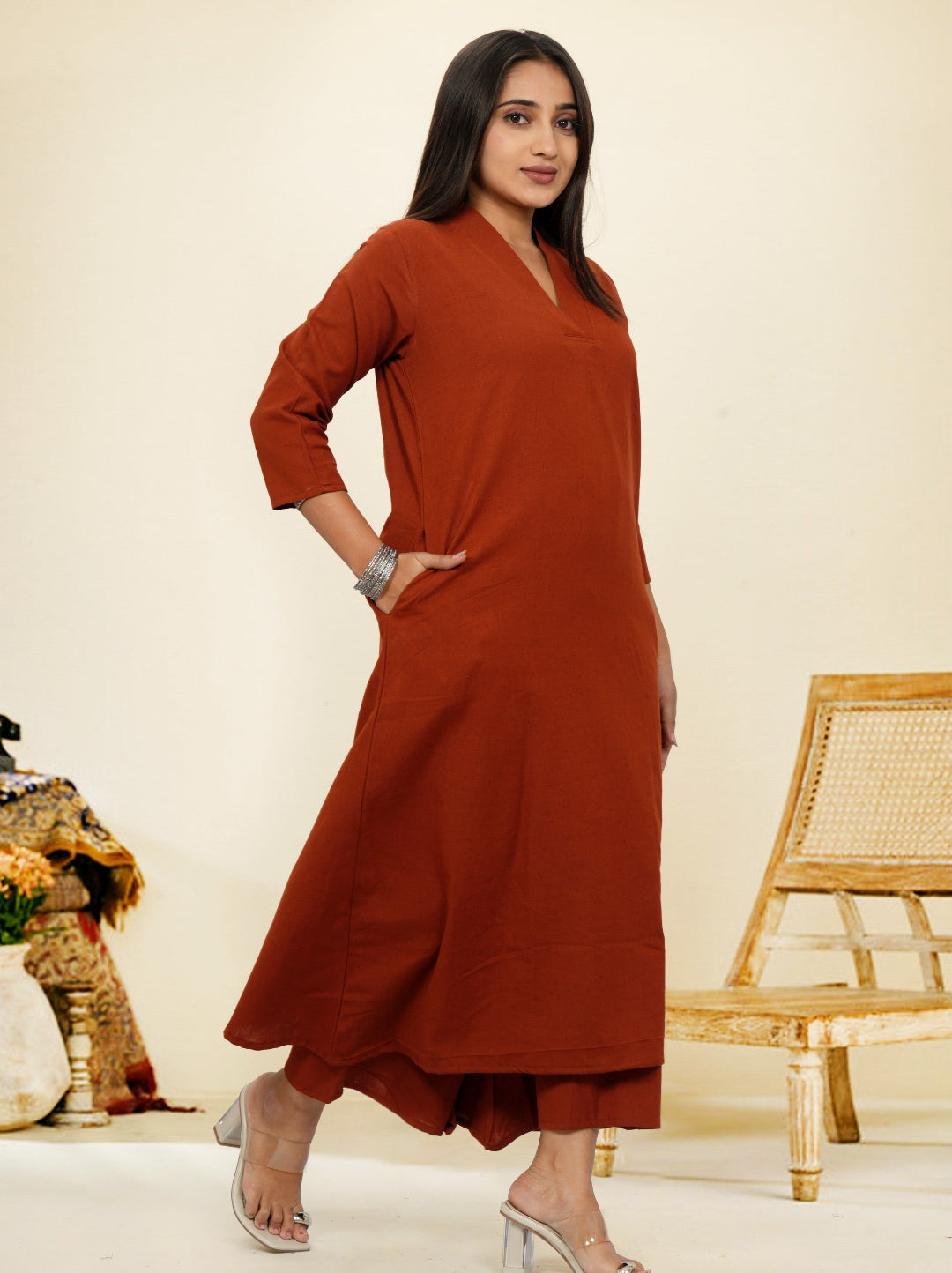 Woman wearing a rust-colored Co-ord set.